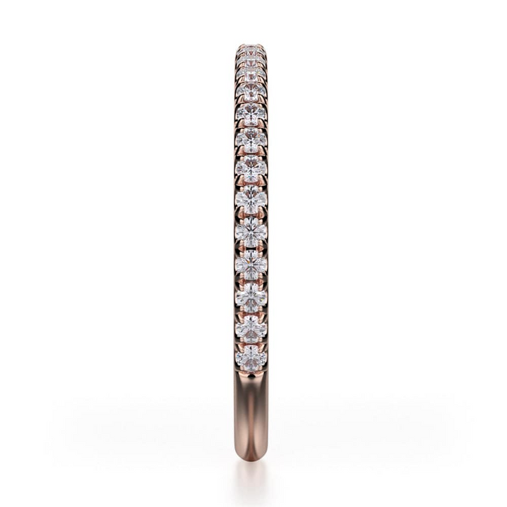 This is a close-up of the side view of the rose-gold ring. It features a bezel set of round diamonds and a rose gold band.