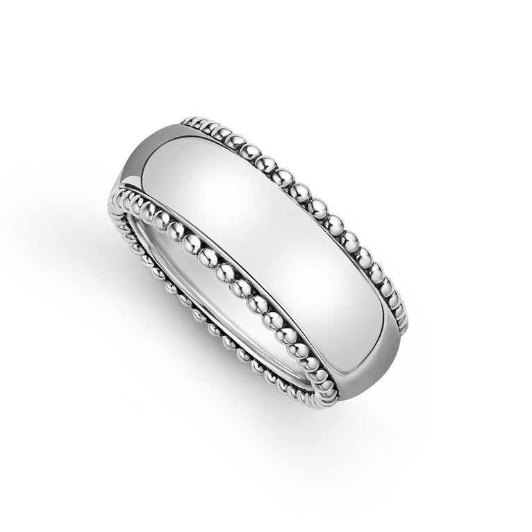 A ring is angled in the middle of a white background featuring Smooth sterling silver and Caviar beading