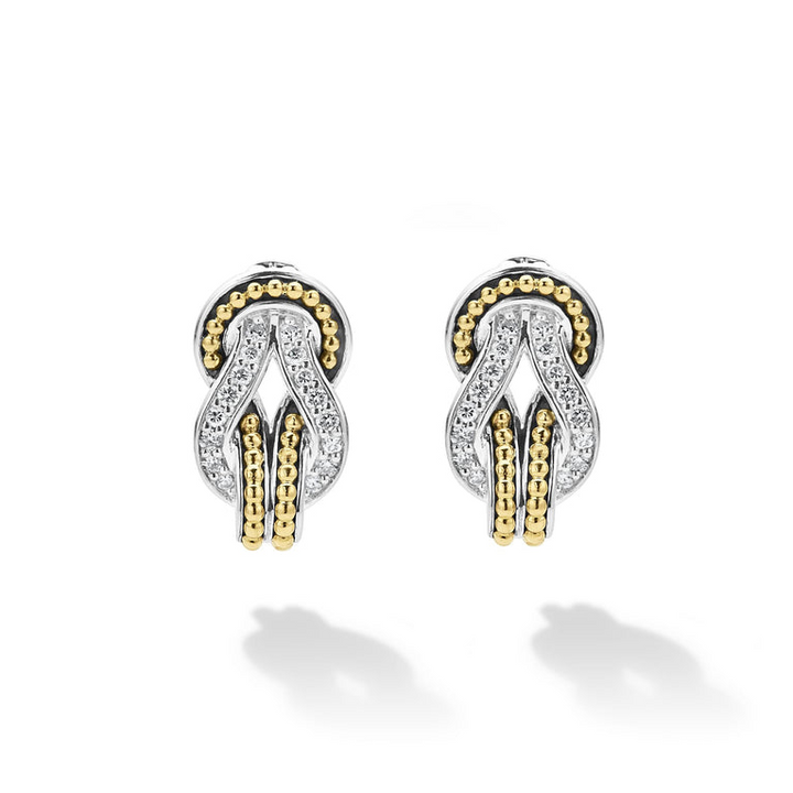 A pair of omega clip huggie earrings with diamonds and 18K gold woven in a knot motif.