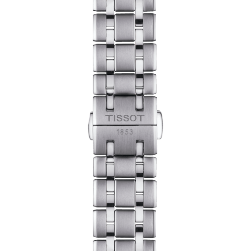 A close-up of a Tissot watch focused on the stainless steel strap and clasp.