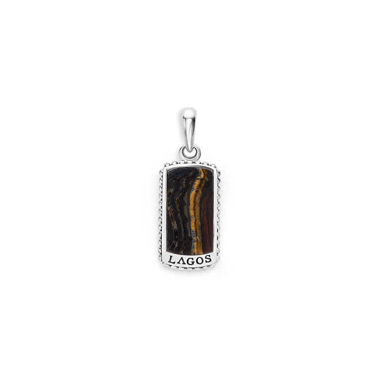 A Tiger Iron Tag Amulet featuring a Tiger Iron gemstone accented by sterling silver Caviar beading is displayed in the middle of a white background