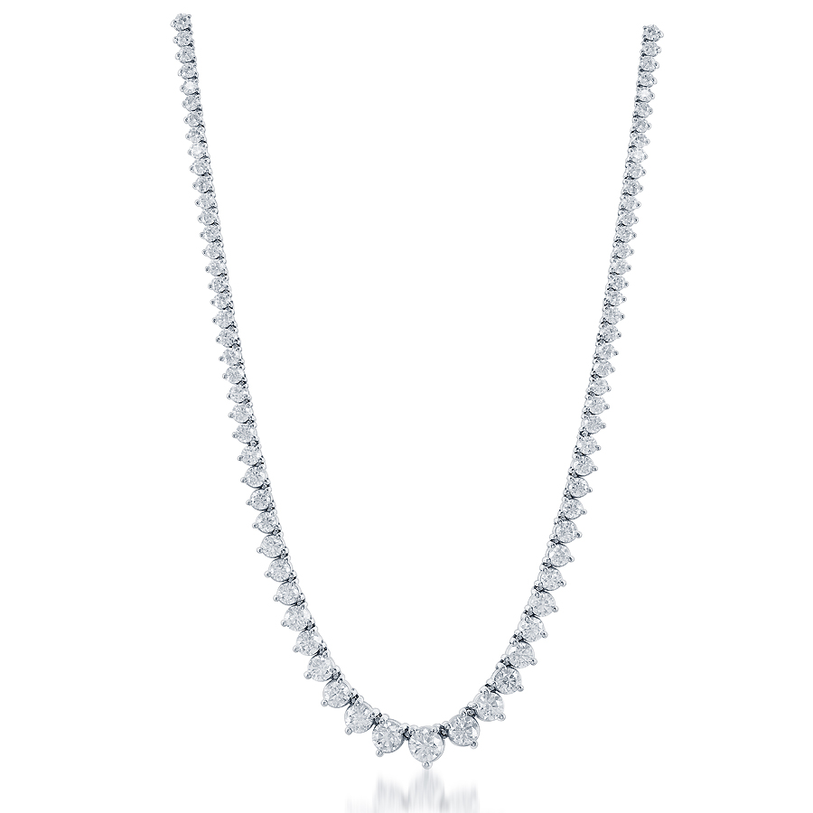 A close-up of a white-gold Graduated Diamond Riviera Necklace against a white background. The necklace features 137 diamonds with triangular-shaped clusters, increasing in size towards the center.