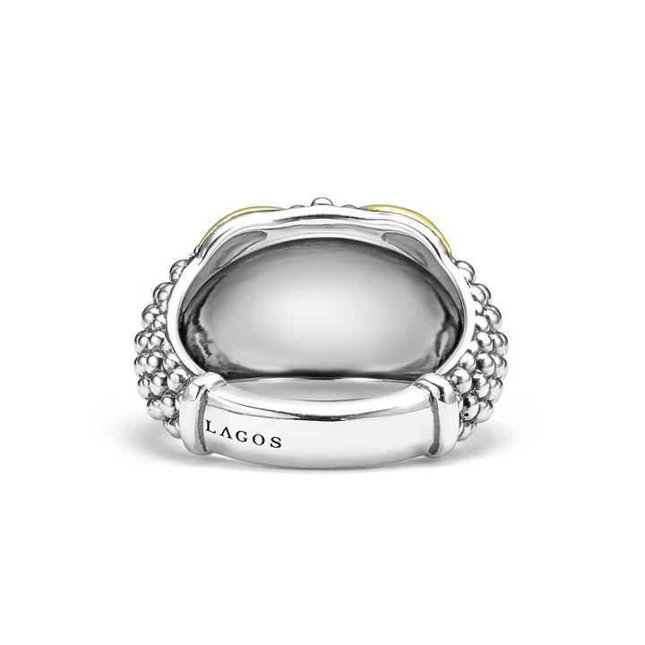 A back-view of a sterling silver and 18k gold ring displayed in the middle of a white background featuring smooth 18K gold and silver Caviar beading with an X motif.