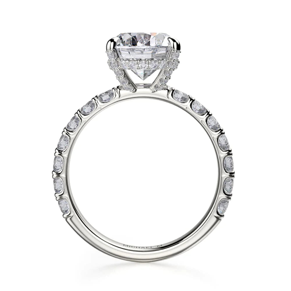 A side-view of the 3/4 Eternity Engagement Ring, made of white gold. The side view shows the diamond's pavilion and the "Michael M" inscription is visible inside the band