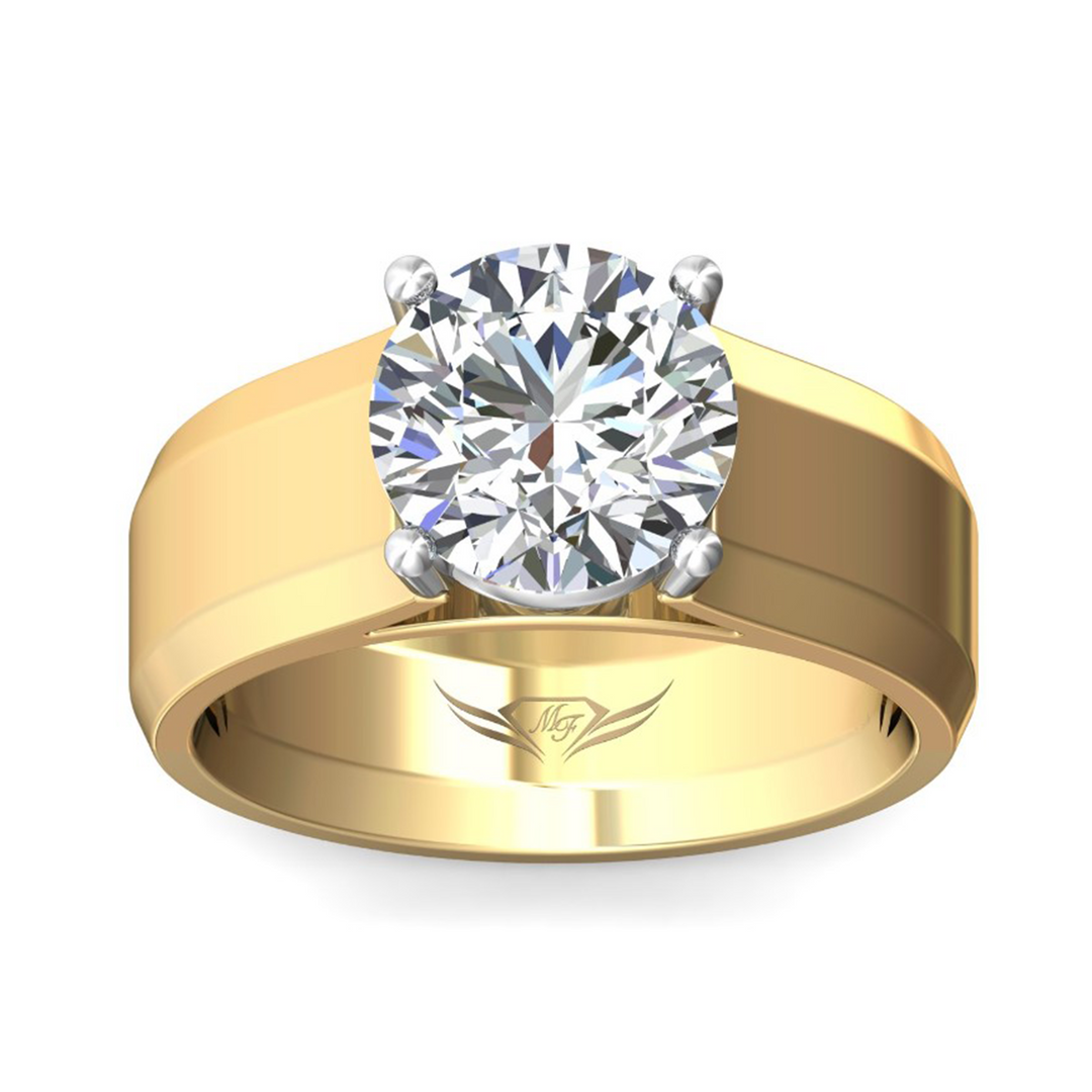 The Cigar Band Engagement Ring is made of yellow gold, tilted forward against a white background. It features a round-cut diamond set in the center with a wide smooth cigar band. Showing the "Martin Flyer" inscription is visible inside the band