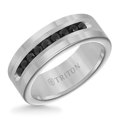 A Tungsten ring is displayed to the left in the middle of a white background. The ring has a black diamond inlay band.