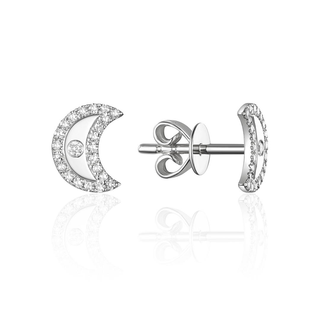 A pair of stud earrings with a half-moon design with sparkling diamonds that are set on the back. The right earring is angled to the side, showing the back.