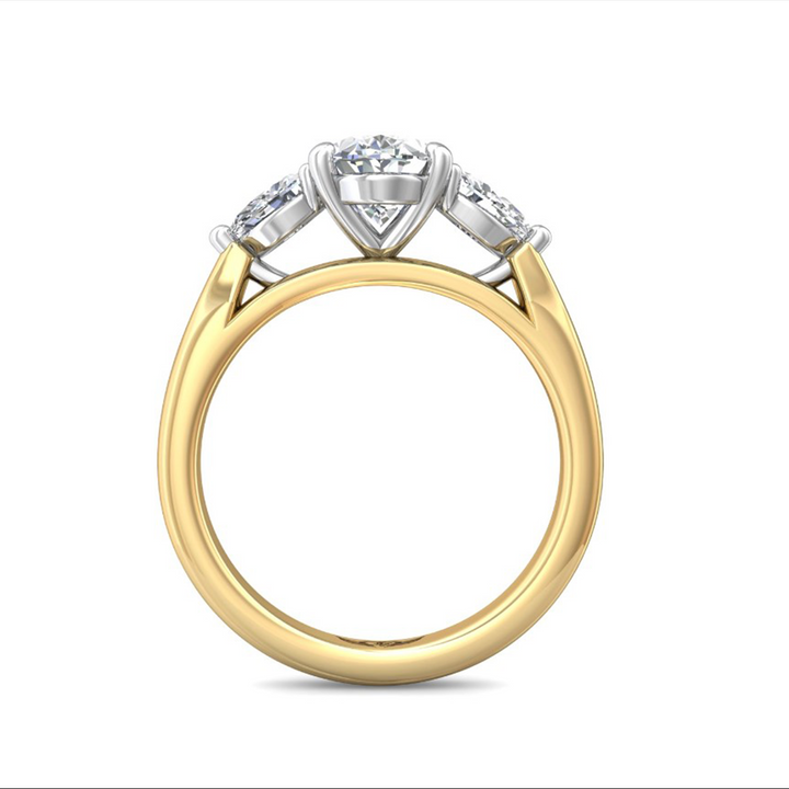 A side-view of the Pear Side Stones Engagement Ring, made of yellow gold. The side view shows the diamond's pavilion and the whole yellow gold band. Showing the "Martin Flyer" inscription is visible inside the band at the bottom.