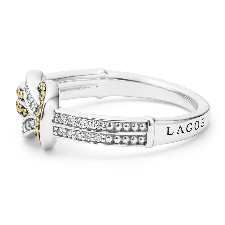 A side-view of a Sterling Silver & 18K Gold ring in the middle of a white background, featuring diamonds and 18K gold woven in a knot motif 