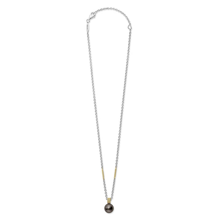 A sterling silver & 18k gold necklace featuring a tahitian black pearl against a white background and showing the clasp at the top.