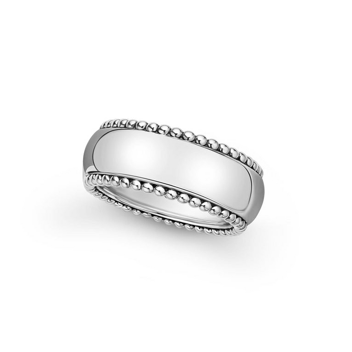 A ring is angled in the middle of a white background featuring Smooth sterling silver and Caviar beading