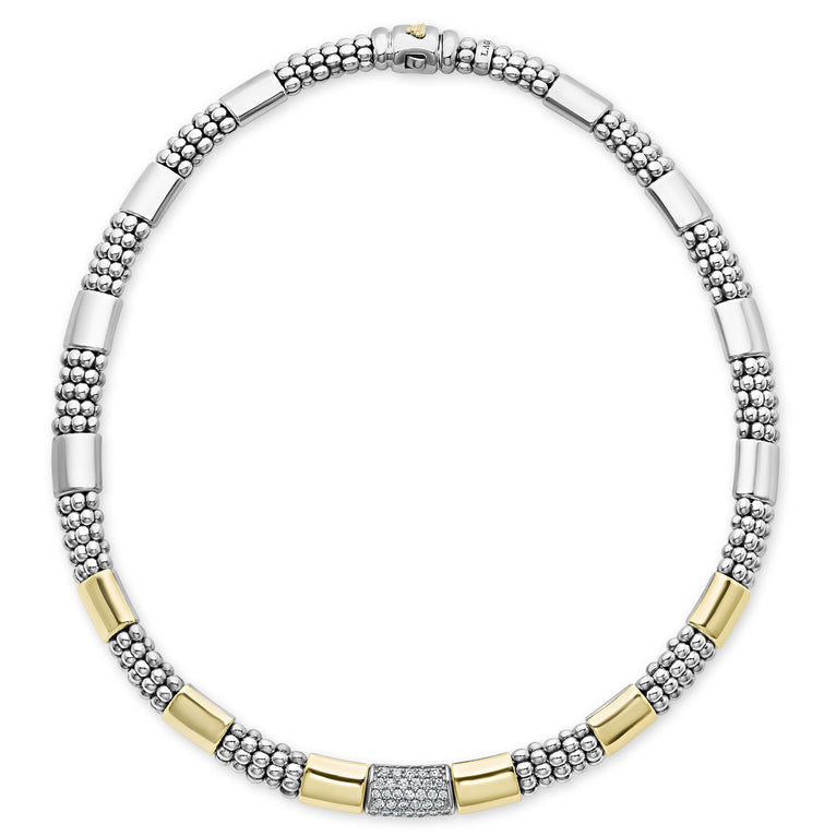 A sterling silver &18k gold necklace featuring round diamonds and smooth stations of 18K gold and sterling silver surrounded by Caviar beading and showing the clasp at the top against a white background.