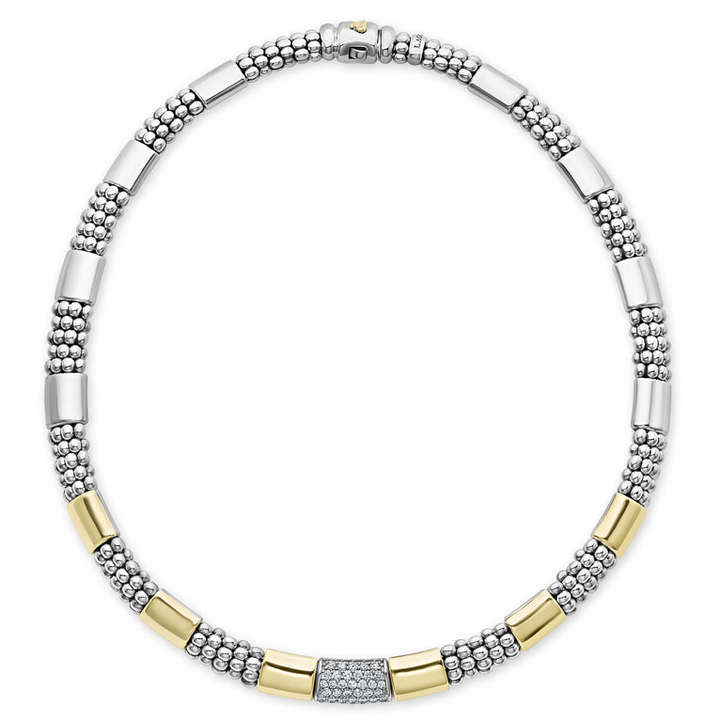 A sterling silver &18k gold necklace featuring round diamonds and smooth stations of 18K gold and sterling silver surrounded by Caviar beading and showing the clasp at the top against a white background.