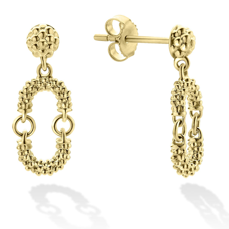 A pair of drop earrings with a link motif of 18K gold with superfine Caviar beads. The right earring is angled to the side, showing the back.