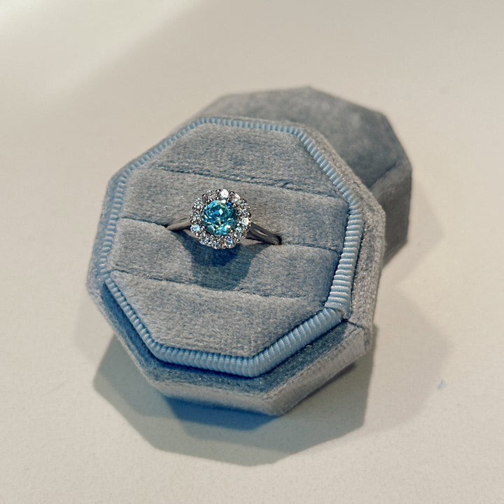 Blue Zircon and Diamond Halo Ring