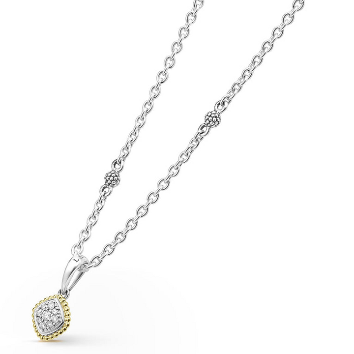 A close-up of a sterling silver & 18k gold necklace angled to the right, featuring a pavé diamond pendant necklace with 18k gold and sterling silver Caviar beading against a white background.