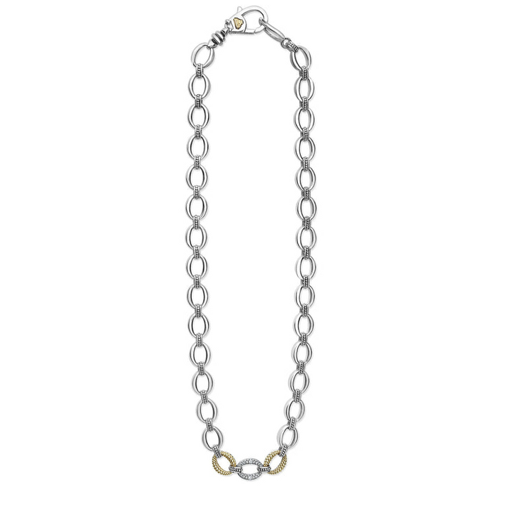 A sterling silver &18k gold necklace featuring a pave diamond link, caviar beading, and a lobster clasp. against a white background and showing the clasp at the top against a white background.