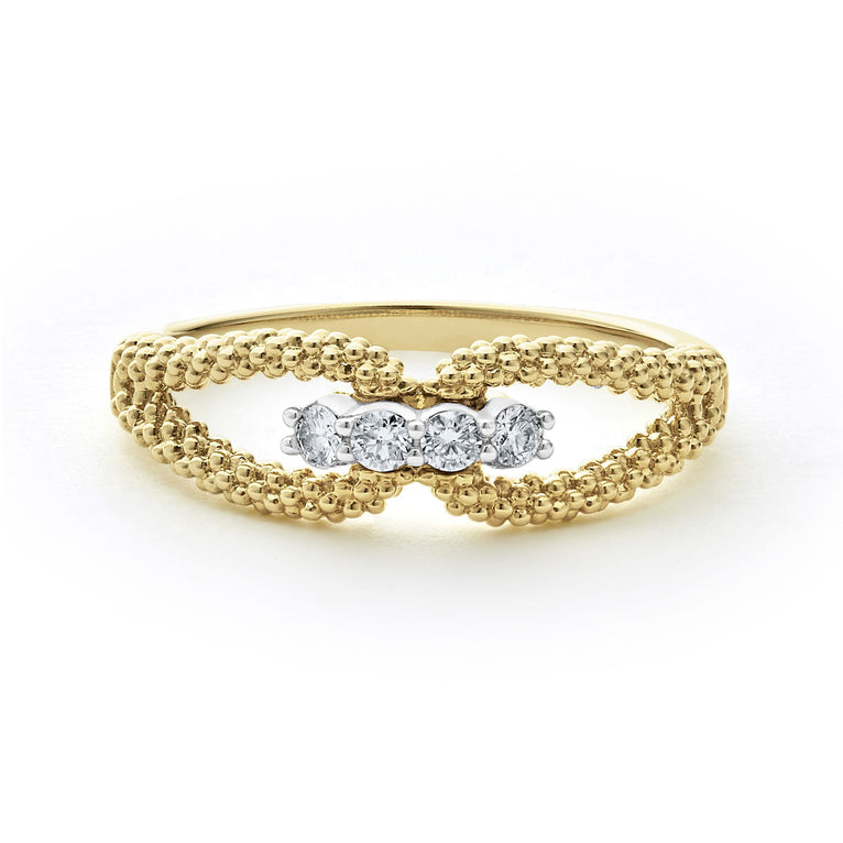 An 18K Gold ring in the middle of a white background featuring caviar beading and round diamonds set in the center.