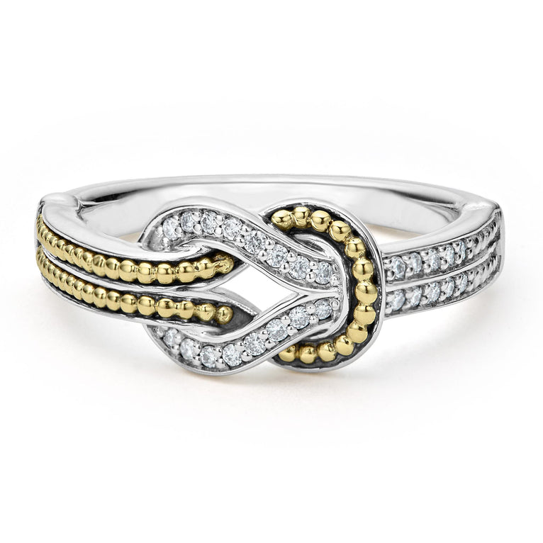 A Sterling Silver & 18K Gold ring in the middle of a white background, featuring diamonds and 18K gold woven in a knot motif 