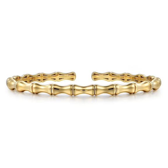 Gabriel & Co 14K yellow gold bamboo-style bar bangle shown from the side with an open back