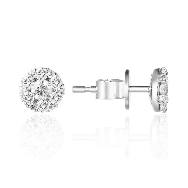 A pair of stud earrings with mixed-sized diamonds. The right earring is angled to the side, showing the back.