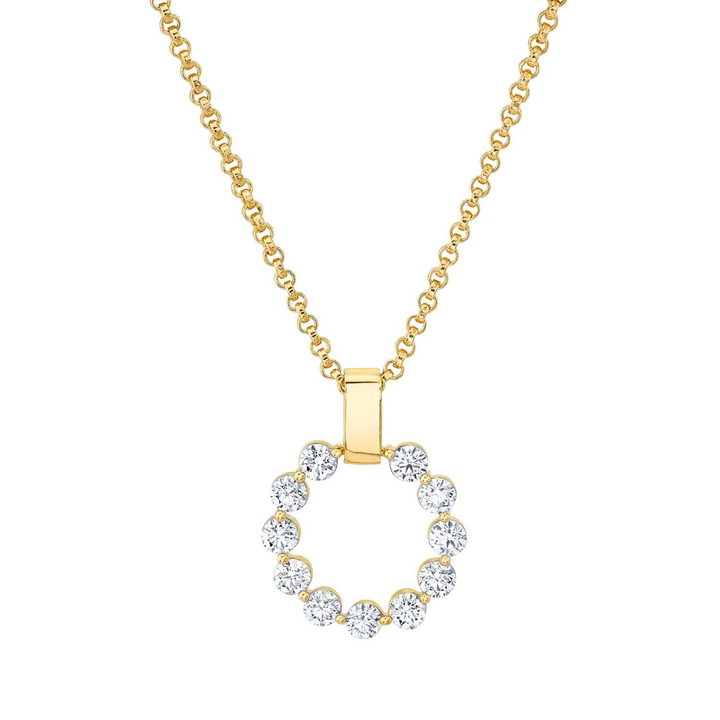 A yellow-gold necklace lying flat against a white background. The bracelet features a circle pendant and a smooth gold bar with a belcher chain.