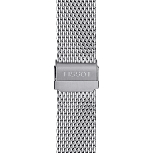 A close-up of a Tissot watch focused on the Milanese bracelet and clasp.