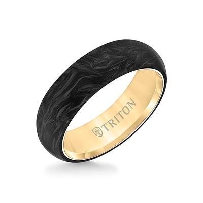 An angled view of a wedding band against a white background. The ring features a carbon flat edge design and an internal gold lining.