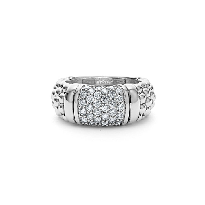 A white gold ring is in the middle of a white background. The ring features alternating designs of diamond-set and caviar beaded stations.