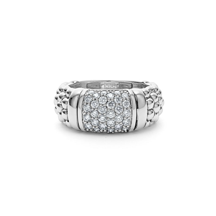 A tilted front view of a white gold diamond ring against a white background. The ring features Pavé diamonds and sterling silver Caviar beading with sterling silver stations in between the diamonds and beading.