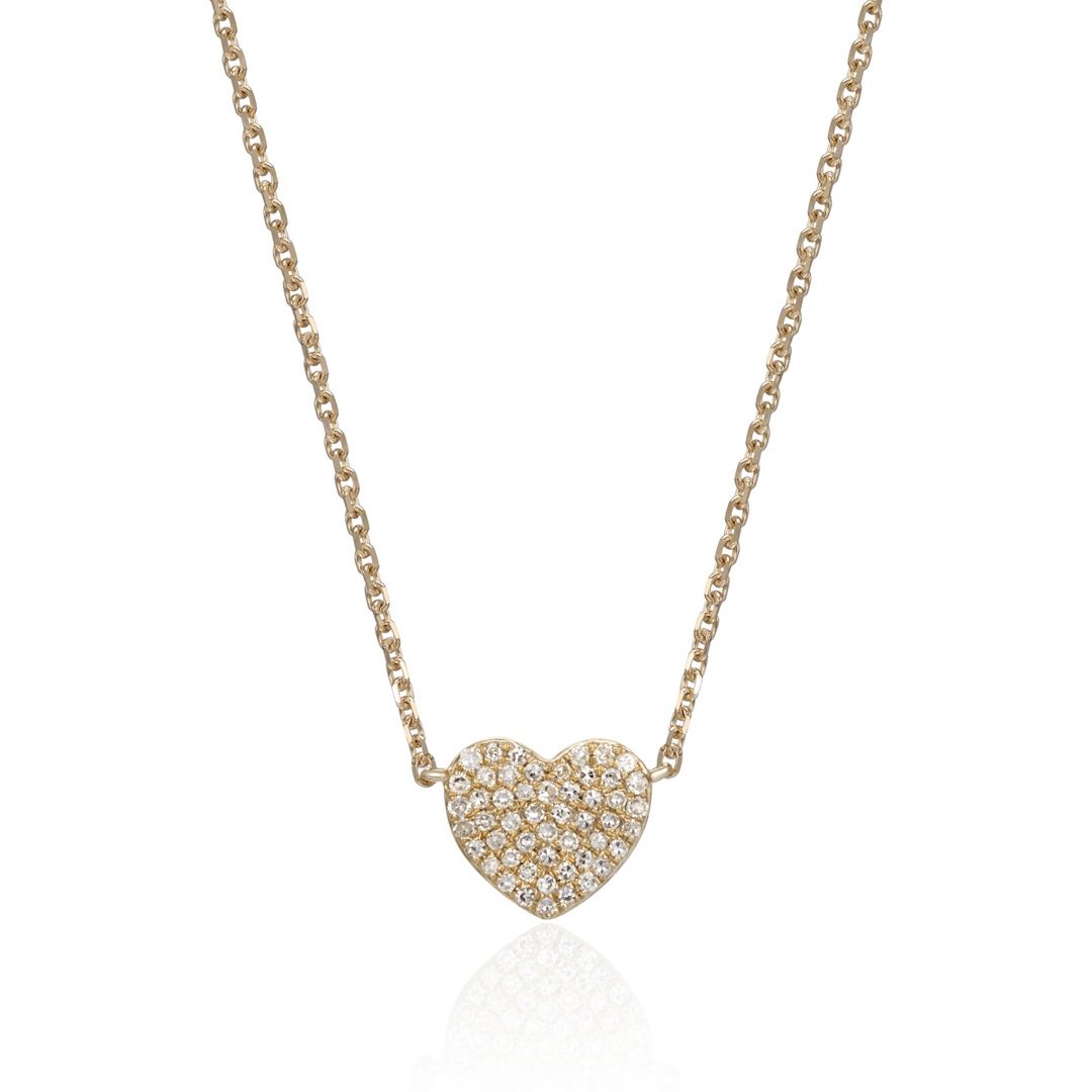 A close-up of a yellow-gold Pave Heart Necklace against a white background. The necklace features a heart-shaped pendant with round diamonds.