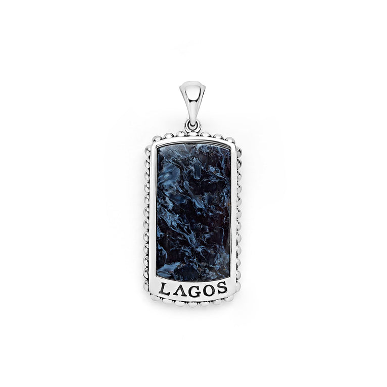 A Pietersite Tag Amulet featuring a Pietersite gemstone accented by sterling silver Caviar beading is displayed in the middle of a white background