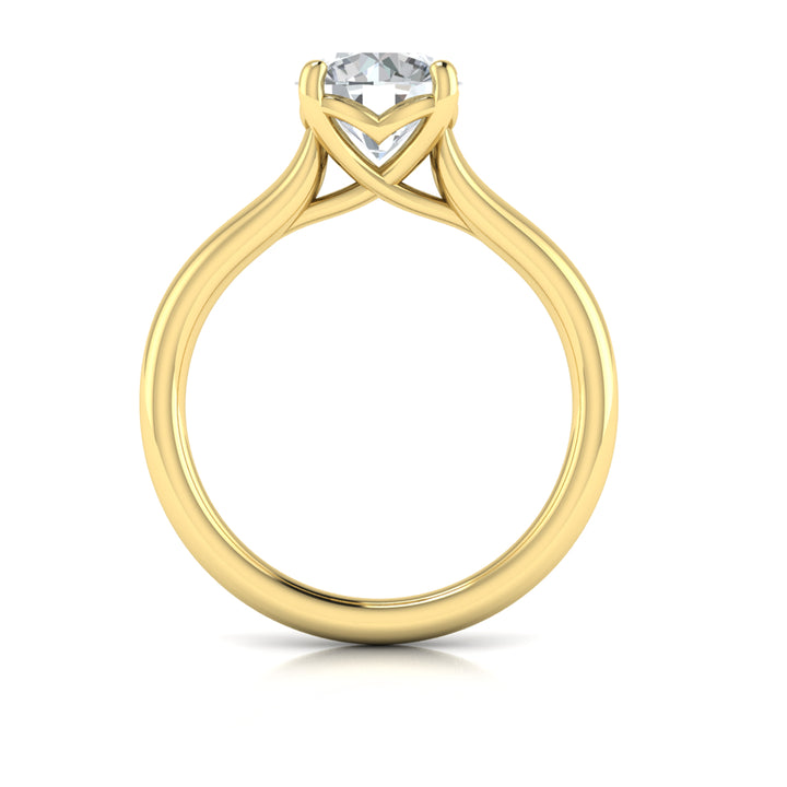 A top view of a yellow gold engagement ring is set against a white background. The engagement ring features a round center diamond, a cathedral setting, and a V-shaped setting.