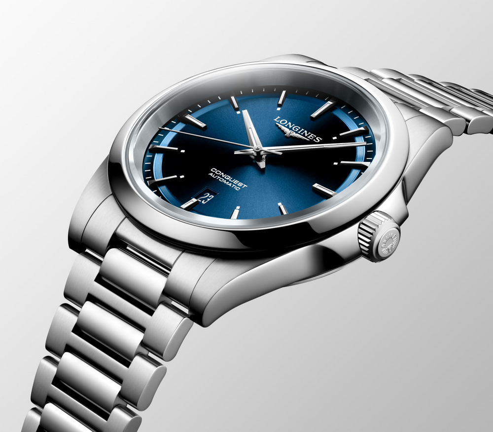 Close up view of LONGINES Conquest with stainless-steel bracelet, blue dial and a 41mm case.