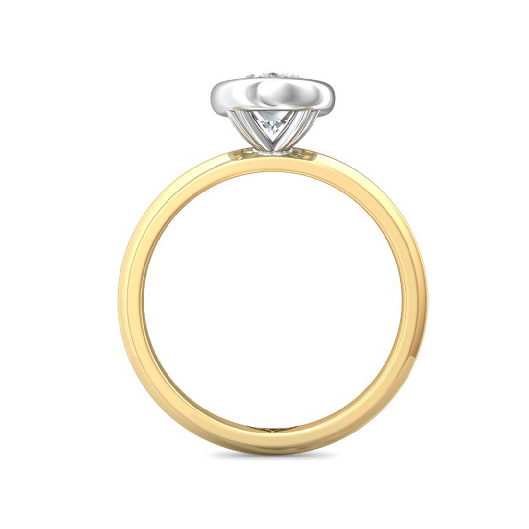 A side-view of the Bezel Set Engagement Ring, made of yellow gold. The side view shows the diamond's pavilion and the whole gold band. Showing the "Martin Flyer" inscription is visible inside the band at the bottom.