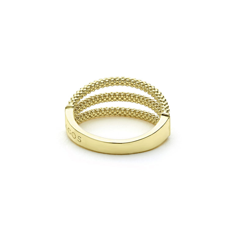 A back-view of An 18K Gold ring in the middle of a white background featuring three rows with caviar beading.