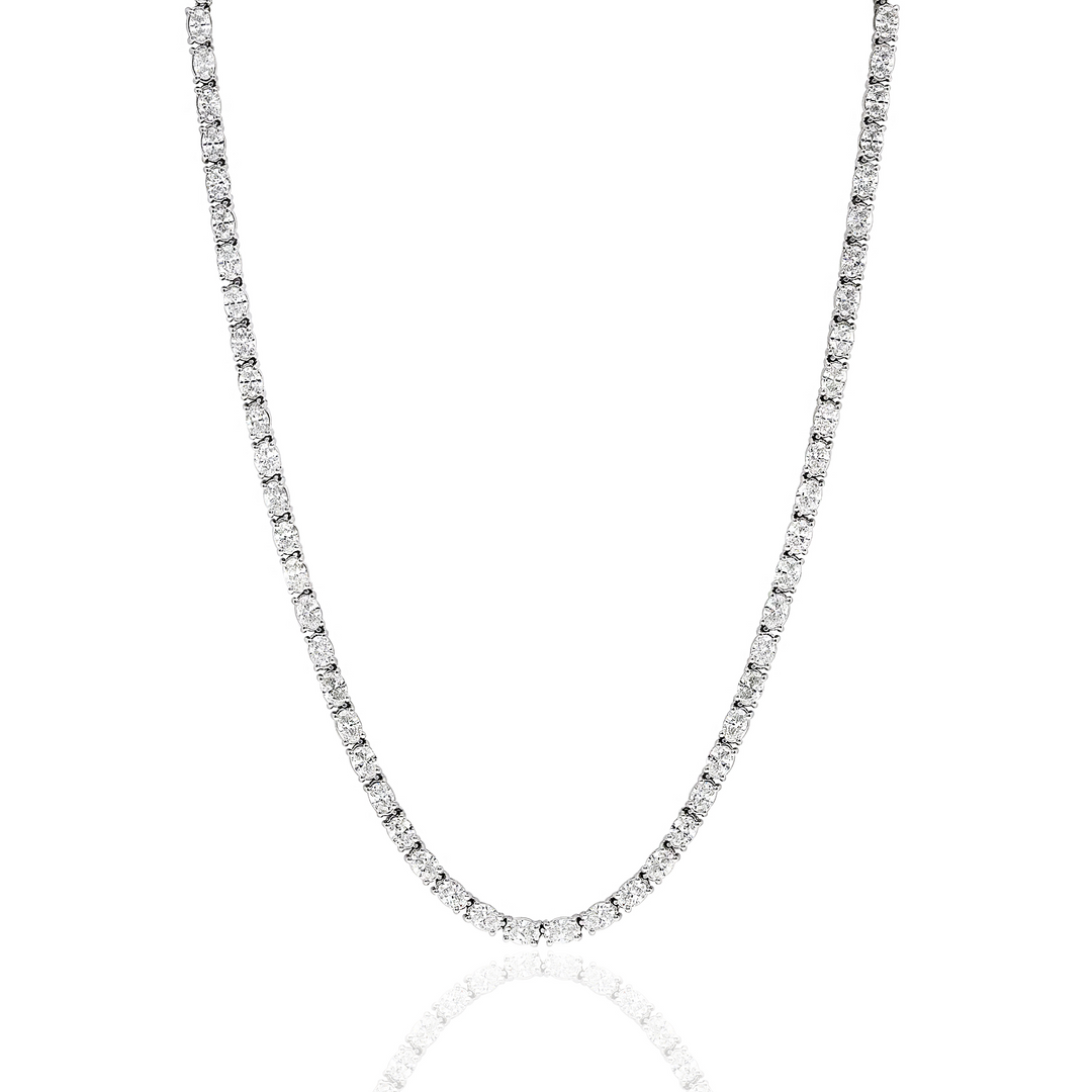 A close-up of a white gold 15-carat Oval Diamond Line Necklace. The necklace features 69 oval diamonds.