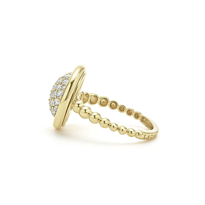 A side view of an 18K Gold round diamond ring on a white background highlighting the band.