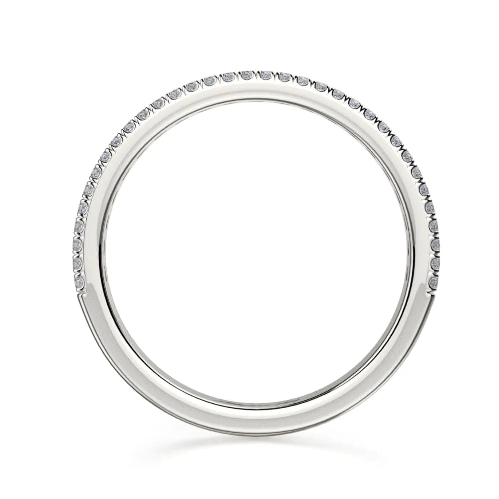 This is a side view of a white gold ring showing the outside of the ring and the white gold band.