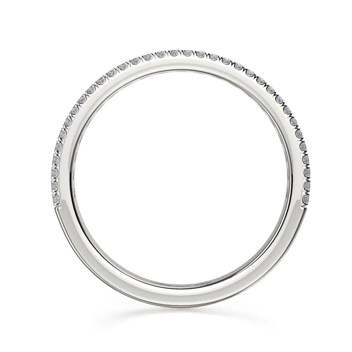 This is a side view of a white gold ring showing the outside of the ring and the white gold band.