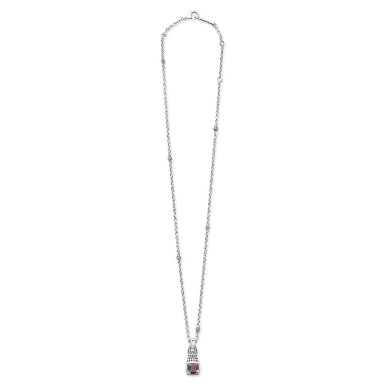 A sterling silver & 18k gold necklace featuring an Amethyst gemstone drop pendant and caviar beading against a white background and showing the clasp at the top.