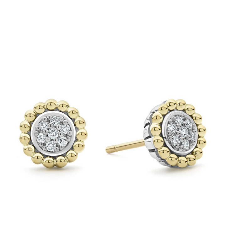 A pair of two-toned stud earrings with a Pavé diamond circle motif framed by 18K gold Caviar beading. The right earring is angled to the side.