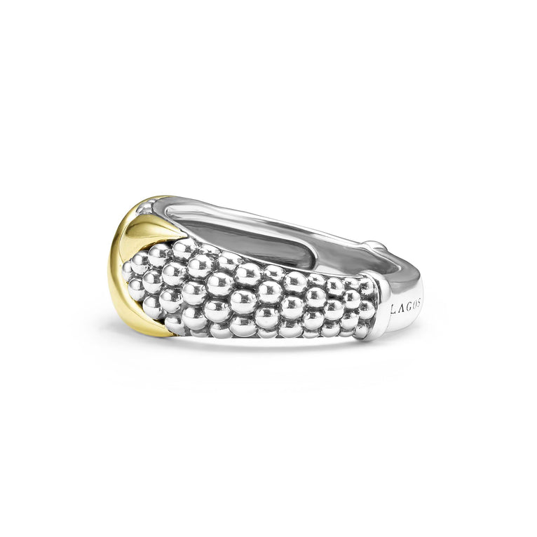 A side-view of a Sterling Silver & 18K Gold ring in the middle of a white background, featuring an x motif and caviar beading