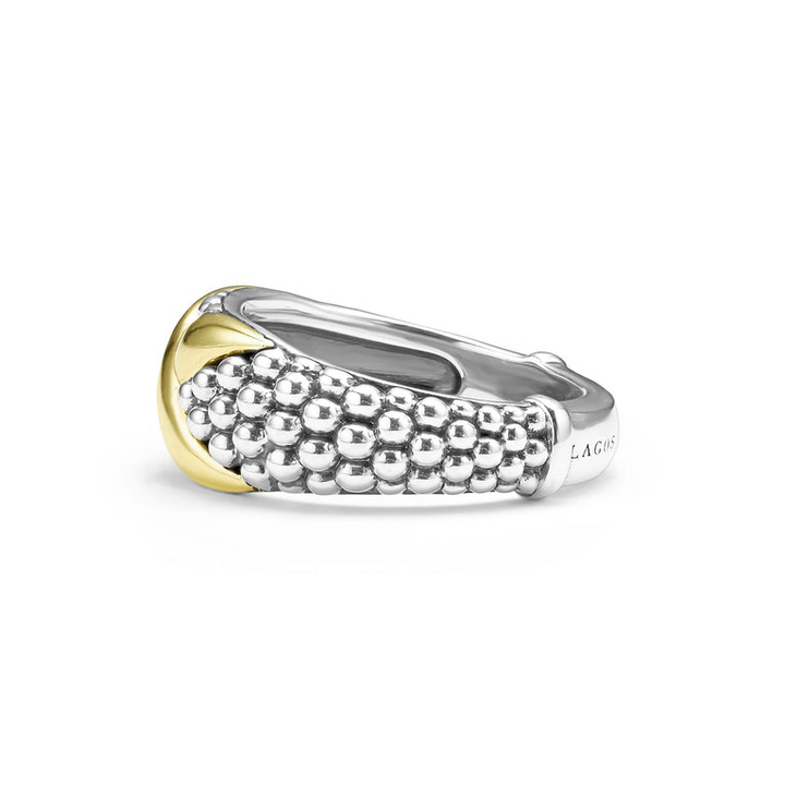 A side-view of a Sterling Silver & 18K Gold ring in the middle of a white background, featuring an x motif and caviar beading