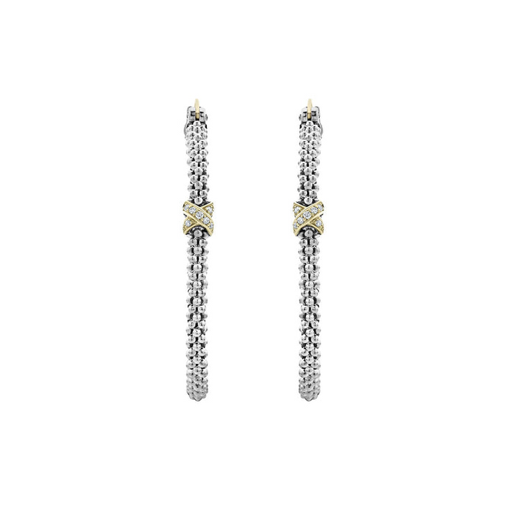 A pair of hoop earrings with a diamond and 18K gold x station with sterling silver caviar beading. 