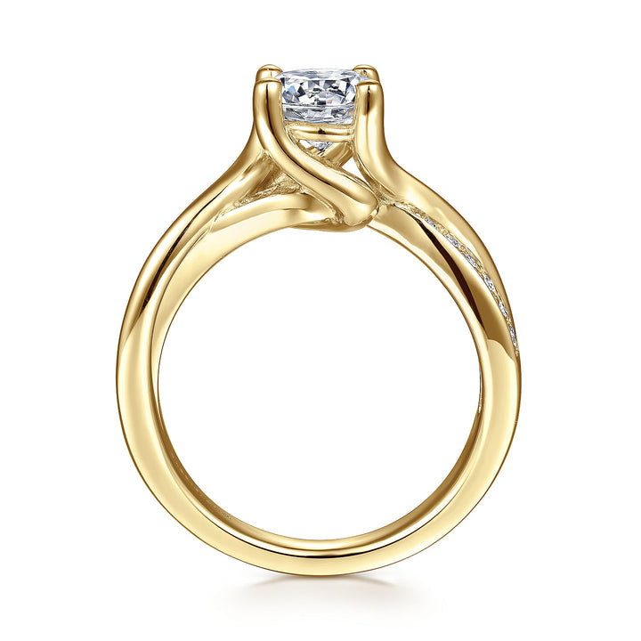 A side view of a ring made of yellow gold. The side view shows the diamond's pavilion and the yellow-gold band.