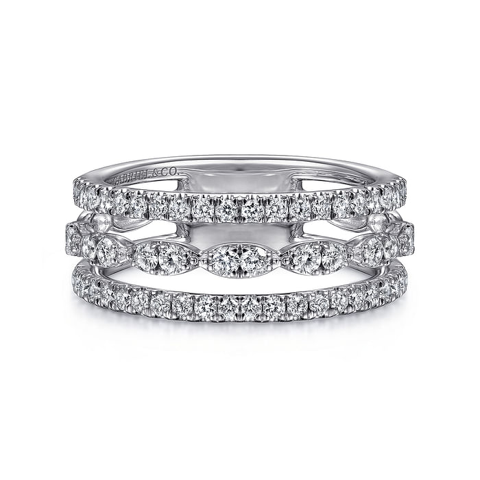 A front view of a white gold diamond row against a white background. The ring features a three-row design with two outer bands featuring straight strands of glittering pavé diamonds, while the central row of diamonds is sculpted into a series of elegant marquise shapes.