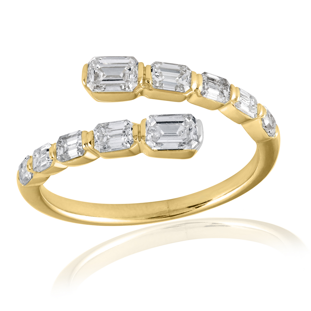 A front view of a yellow gold diamond ring against a white background. The ring features emerald-shaped diamonds set in lustrous yellow gold and a two-row wrap design.