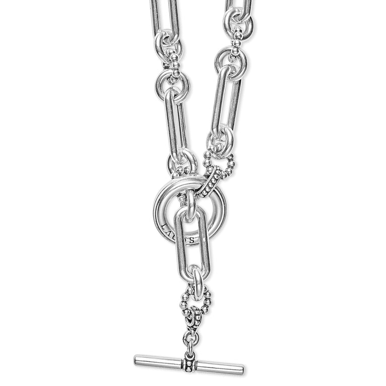 A close-up of a sterling silver necklace highlighting the clasp.