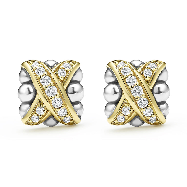 A pair of two-tone stud earrings with 18K gold and diamonds surrounded by sterling silver and an x motif.